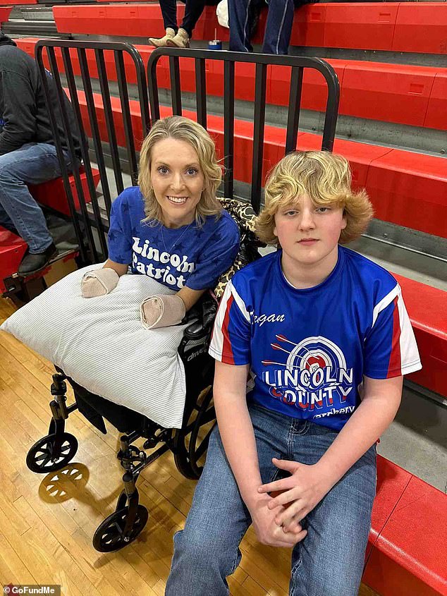 Mullins, photographed with her son at a school event while recovering from a quadruple amputation.