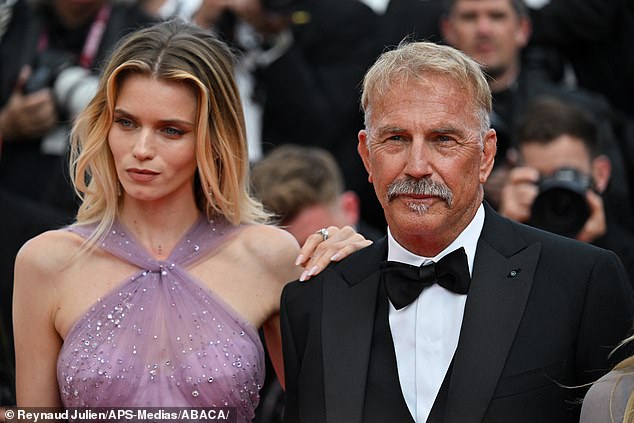 The Melbourne-born beauty caused a sensation alongside the film's director Kevin Costner (right)