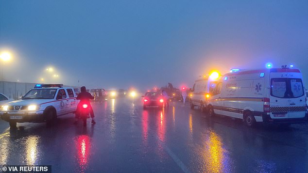 Rescue vehicles participate in the search for the crashed helicopter in which President Raisi was traveling