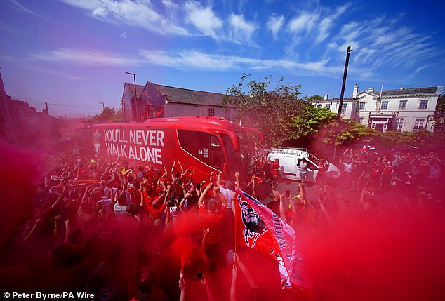 Fans lit red smoke flares as they welcomed Jurgen Klopp in his final game in charge.