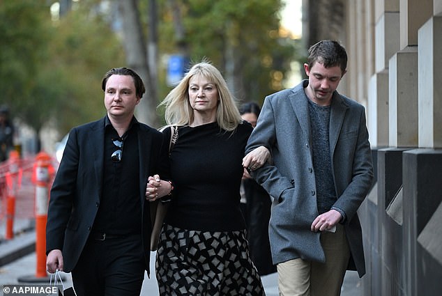 Geordie, Melanie and Elliott Lynn leave the Supreme Court of Victoria in Melbourne