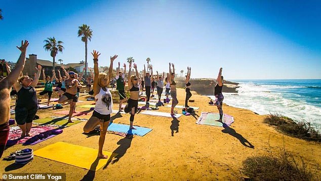 Classes have been held at beachside locations for over a decade without problems, until now. Pictured is a yoga class at Sunset Cliffs.