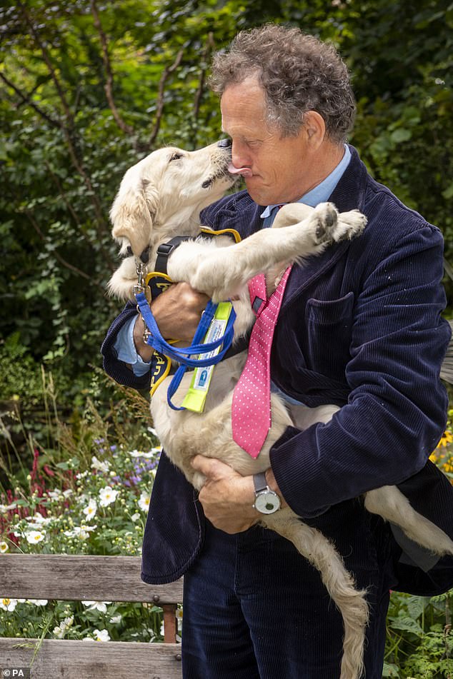 Monty has many sold-out tours across the country and millions of followers on Instagram. Above: the gardener with a guide dog puppy in training