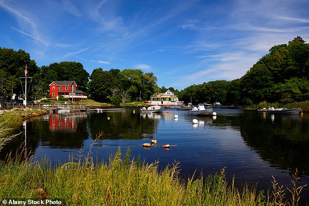 Children play, dogs swim and small boats row on the river that remains calm in part thanks to the Ipswich Dam.