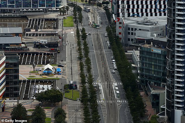 Despite the sign, it is illegal to drink anywhere in Melbourne's CBD, 24/7 (pictured, the area near Marvel Stadium where the sign is located)