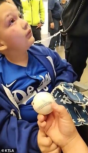 Nathan Sanchez later received the ball from a fan sitting nearby on Friday.