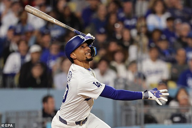 Los Angeles Dodgers' Mookie Betts reacts after a foul during the sixth inning on Friday