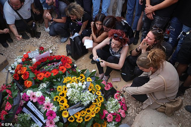 The German-Israeli was one of the 364 people murdered at the SuperNova festival she was attending with her boyfriend. You can see flowers placed yesterday on her grave.