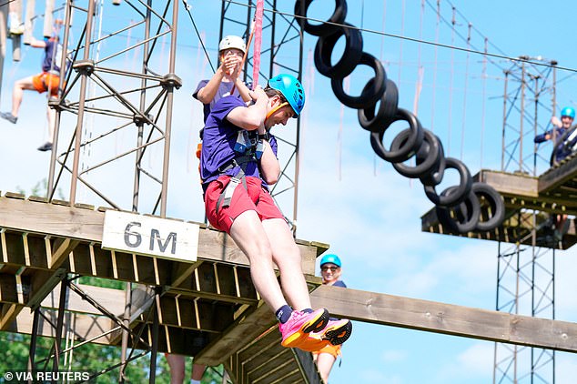 Christian image lowered from a tower before running a mile as part of Royal Run today