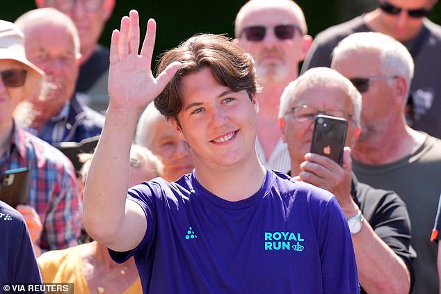 He was also photographed soaking up the excited atmosphere as he ran through the crowd at Broenderslev.