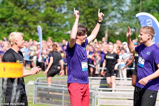 Denmark's Crown Prince Christian pictured today taking part in the one mile race in Broenderslev