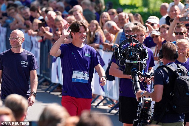 Christian, pictured, appeared to be in high spirits as he took part in the annual Danish 'Royal Run' today.