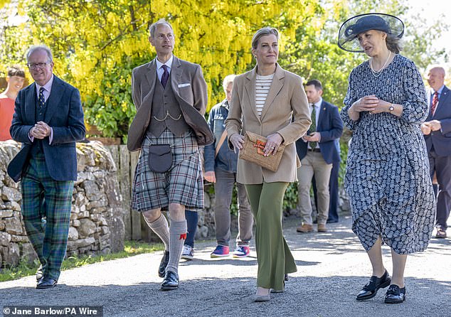 The royal couple met Lord Lieutenant Patrick Marriott (far left) and Golspie Community Council president Henrietta Marriott (far right).