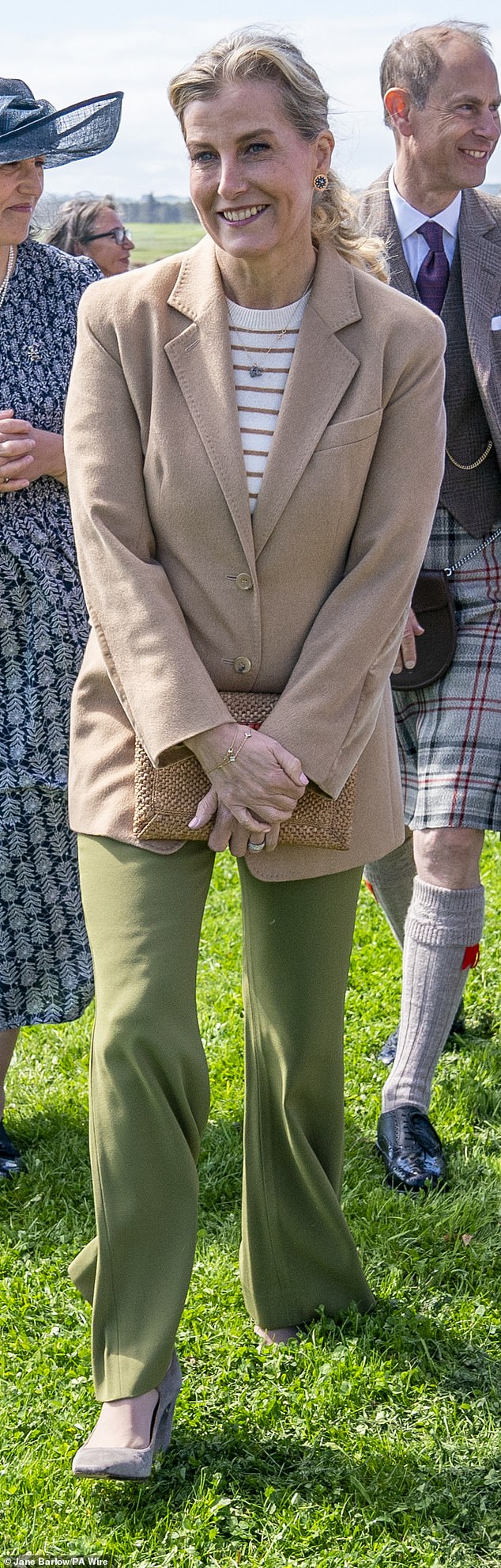 The 59-year-old had her blonde hair styled in a simple but elegant ponytail for the official visit.