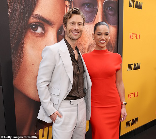 Adria is pictured with her Hit Man co-star Glen Powell last week.