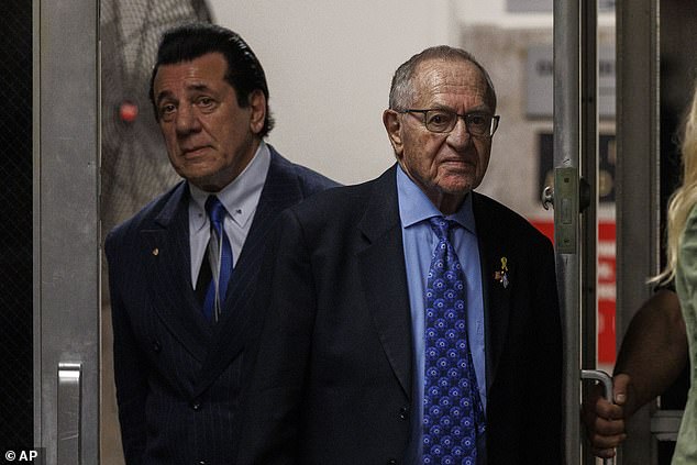 American actor Chuck Zito, left, and attorney Alan Dershowitz return from lunch to the trial of former President Donald Trump in Manhattan Criminal Court, Monday, May 20, 2024.