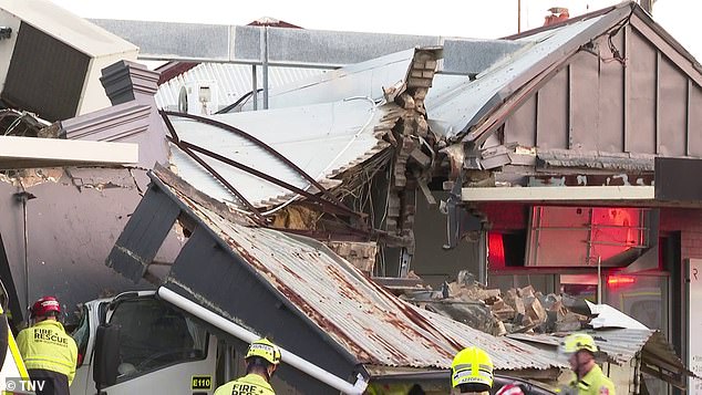 Part of the roof collapsed and the bricks came loose, falling on the windshield of the truck.