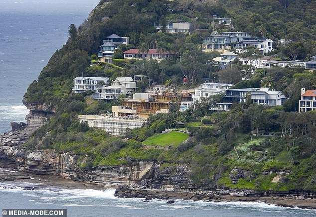 The couple have caused a stir among their neighbors in recent years as they develop an extravagant beachfront home on the cliff at Whale Beach.