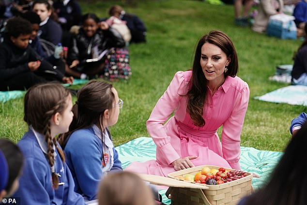 The Princess of Wales chats to schoolchildren at the first Chelsea Flower Show children's picnic in 2023