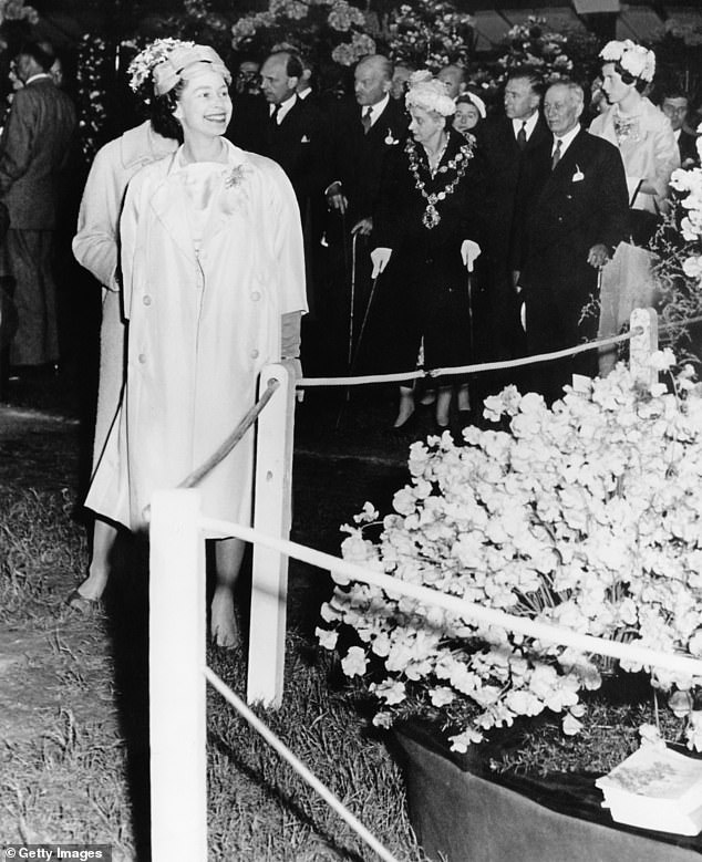 Queen Elizabeth II on a tour of the Chelsea Flower Show in May 1960