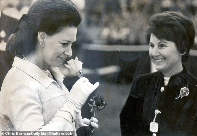 French florist Louisette Meilland gives Princess Margaret a rose to smell in 1968. The flower is named after the queen's sister.