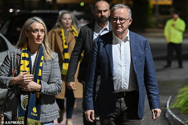 The Prime Minister (pictured with his fiancee Jodie Haydon in Gosford on Saturday night) has long maintained that he wants the election cycle to be extended to four years, and has offered no clear indication that he intends to call elections early.