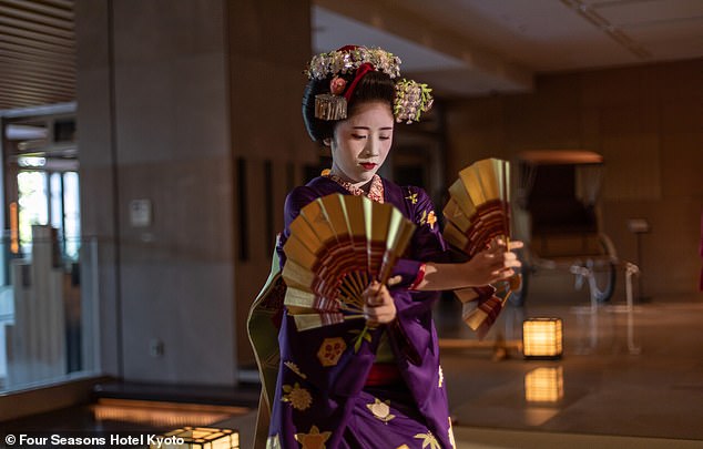 Performance by a maiko, an apprentice geisha, in the hotel lobby