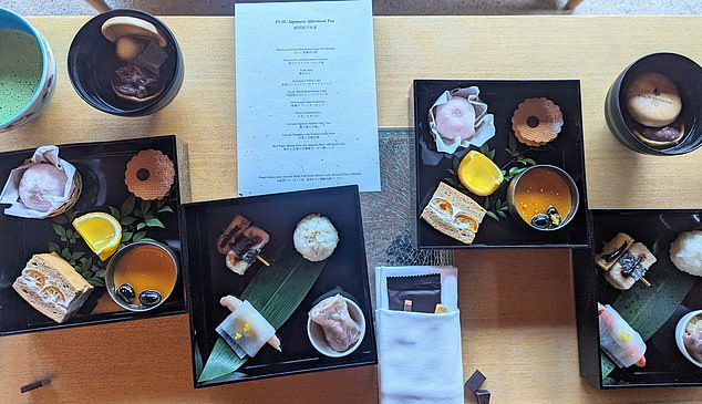 Afternoon tea is beautifully presented in Bento boxes in the Fuju lounge.