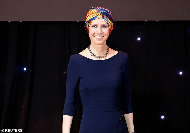 Asma al-Assad is seen with her hair covered while receiving cancer treatment in 2018.