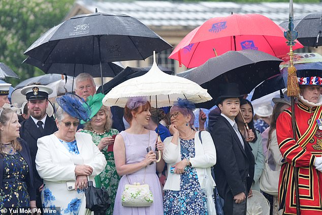 I can't reign in my parade! Guests made sure umbrellas were up so as not to get in the way of the evening.