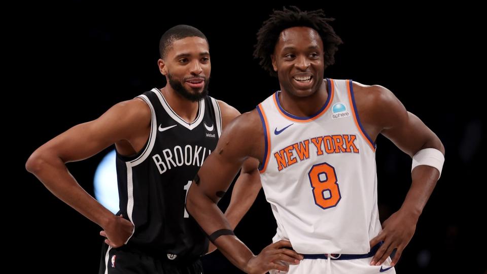 January 23, 2024; Brooklyn, New York, United States; Brooklyn Nets forward Mikal Bridges (1) and New York Knicks forward OG Anunoby (8) talk during the first quarter at Barclays Center. 