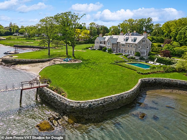 Listed by Jennifer Leahy of Douglas Elliman, the property sits on 1.6 waterfront acres along Long Island Sound on Indian Field Road.