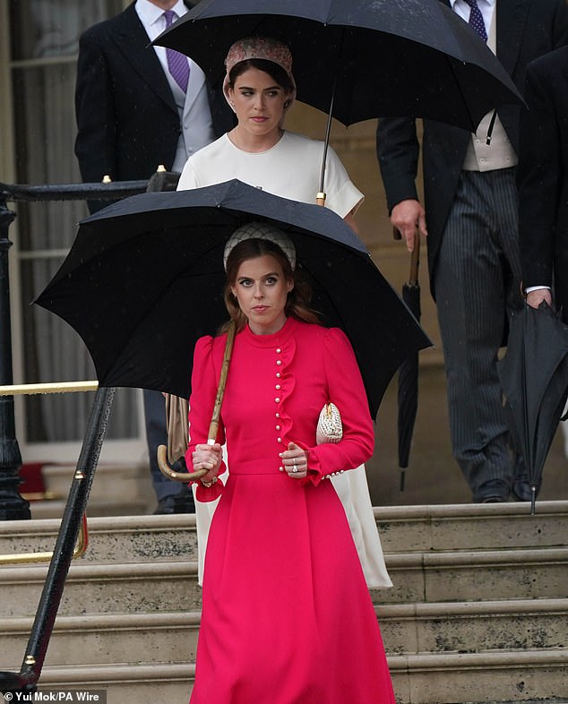 Sisters Princess Beatrice and Eugenie gathered for the sovereign's garden party at Buckingham Palace.