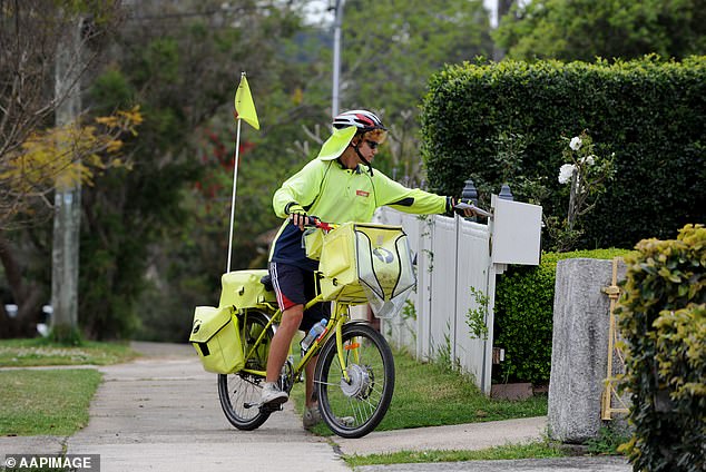 The list included some companies that the public often complain about, such as Australia Post (worker pictured).