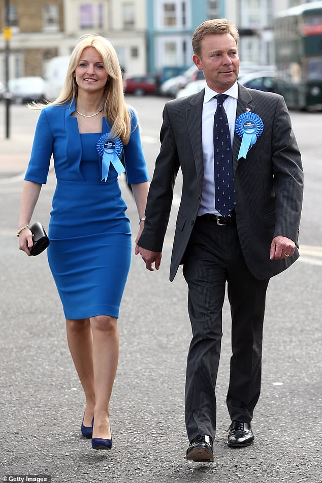 Craig Mackinlay and his wife Kati arrive at the Thanet South constituency counting center on May 8, 2015 before being elected as a local MP.