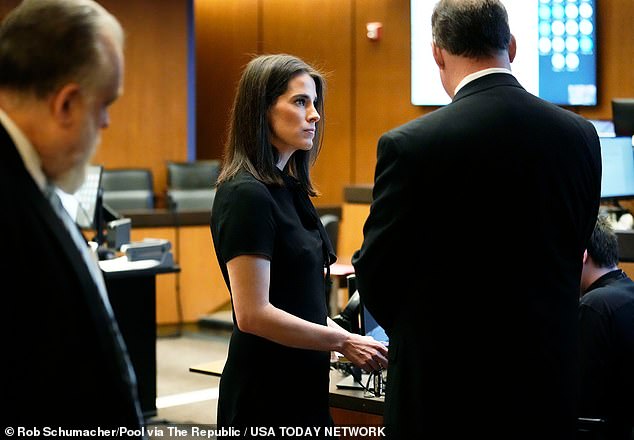 Christina Bobb appears with her attorney (right) at her arraignment in Maricopa County Superior Court in Phoenix. She and others were indicted by a grand jury for conspiracy stemming from the 2020 election.