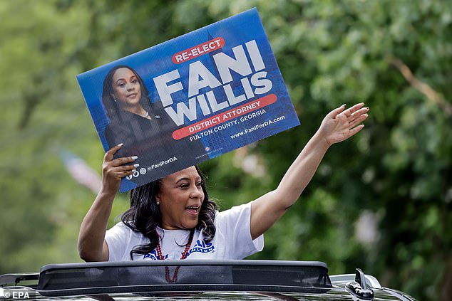 Fulton County District Attorney Fani Willis participates in a parade