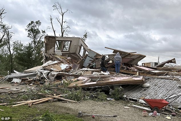 Heavy cleanup crews have been seen across the state, with unaffected counties, including Guthrie and Madison, reportedly enlisted to help clean up damage in Greenfield (pictured).