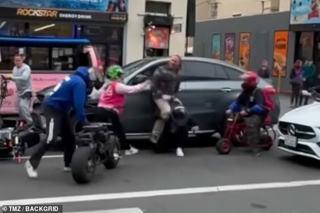 Pictured: The shocking altercation between the mini biker gang and Ian Ziering in Los Angeles.