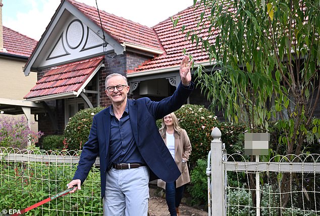 Anthony Albanese and his fiancee Jodie Haydon outside their home in Marrickville.