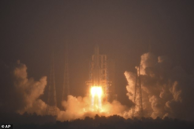 China on Friday launched its Chang'e 6 rocket (pictured) that will travel to the dark side of the moon to collect rock samples from the lunar surface.