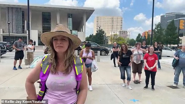 Dozens of women lined up to share their experiences at the event in Tulsa on Friday.