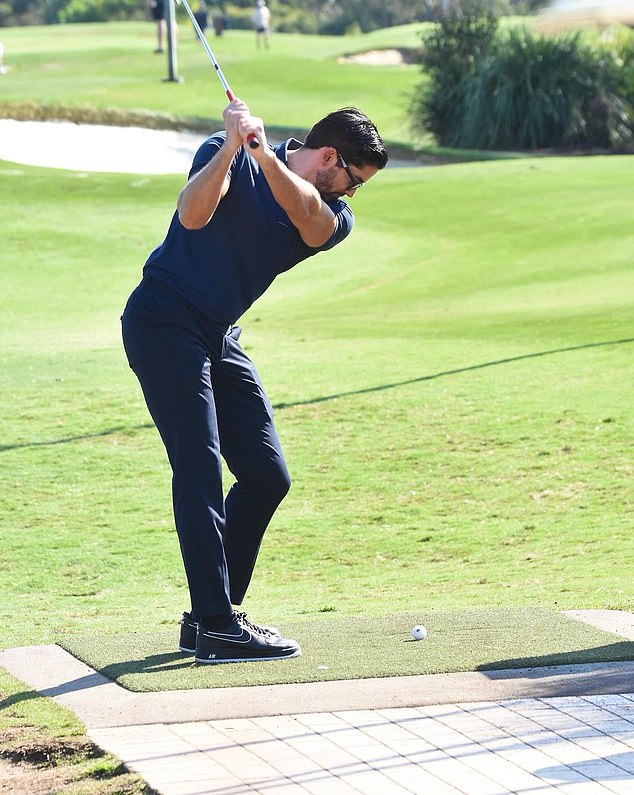 Duncan was seen with a beaming smile, confidently holding his golf club and ready to hit the course.