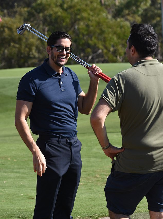 The 37-year-old cybersecurity expert cut a dapper figure in a navy polo shirt paired with matching pants, exuding confidence and charm as he prepared for a day in the field.