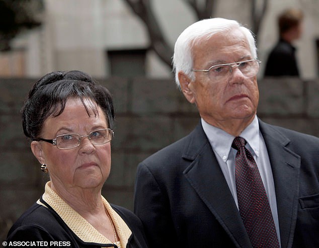 The parents of shooting victim Sherri Rasmussen, Neil Rasmussen and his wife Loretta appear at a news conference after a court hearing for Los Angeles Police Detective Stephanie Lazarus, Tuesday, June 9, 2009 in Los Angeles. .