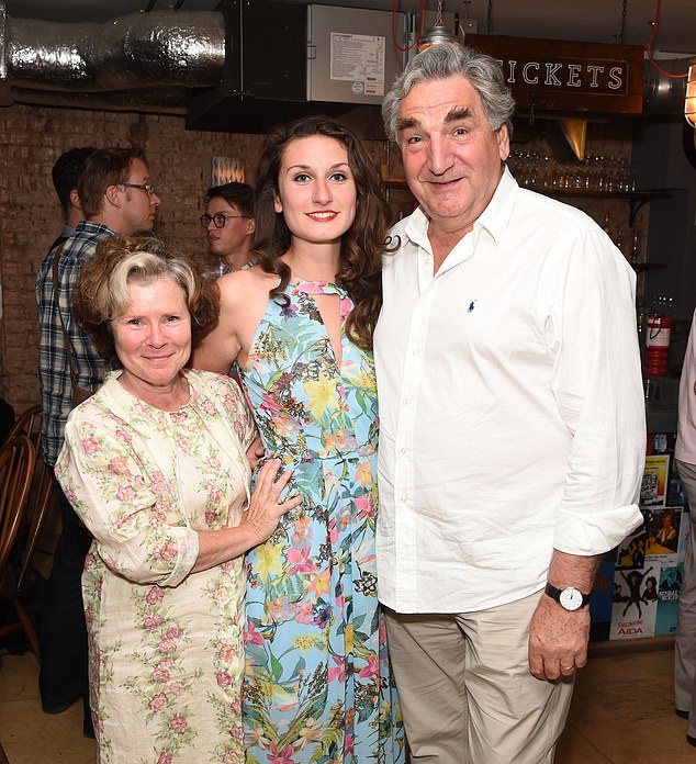 Bessie is seen with her parents Imelda and Jim in 2016.