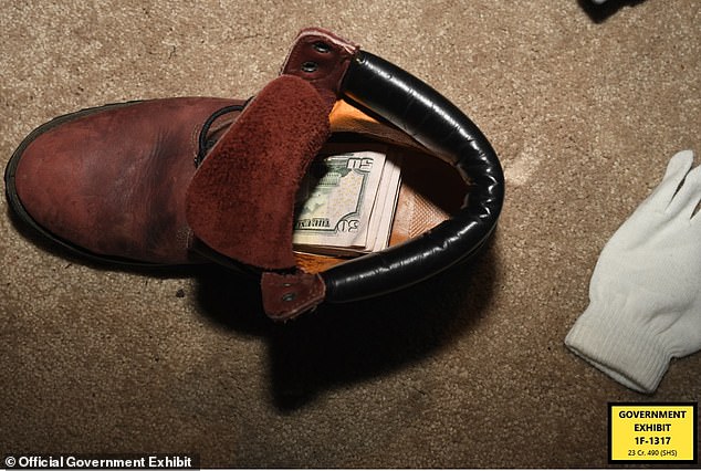 He even stuffed money into a Timberland boot found in his home.