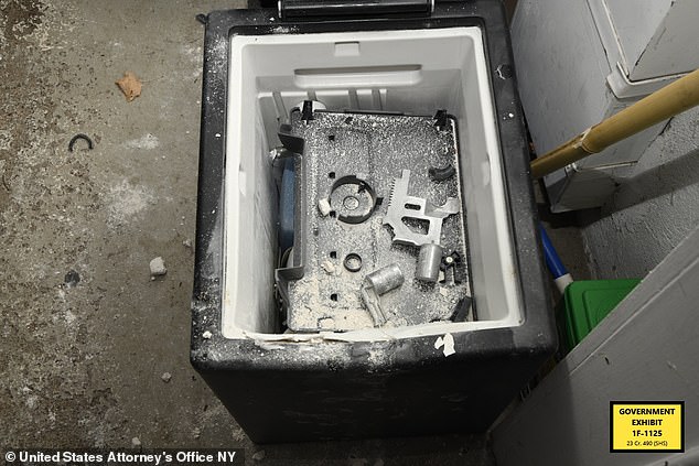 More photos taken of what appears to be a safe.