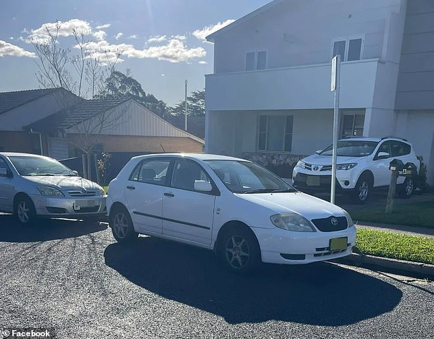 The white car, parked illegally on the street, was very close to another car, which was parked legally, resulting in too small a space for the 4x4 to pull out of the driveway (pictured).