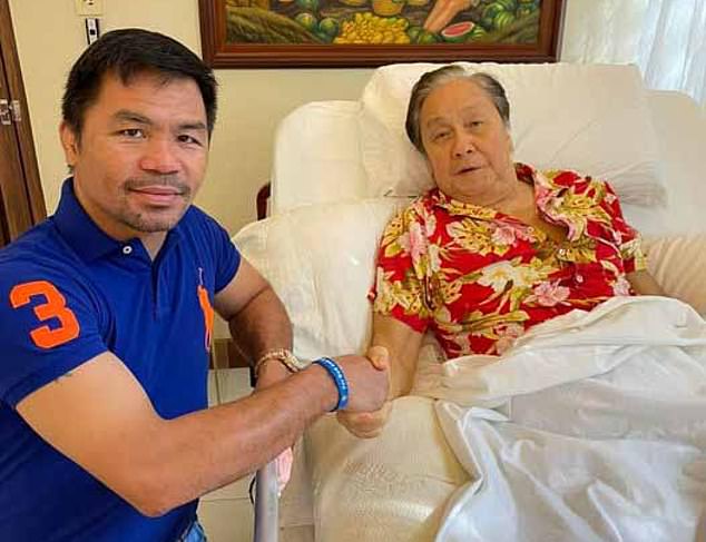 Atienza's grandfather Lito pictured with his presidential running mate Manny Pacquaio, arguably the most famous person in the Philippines.